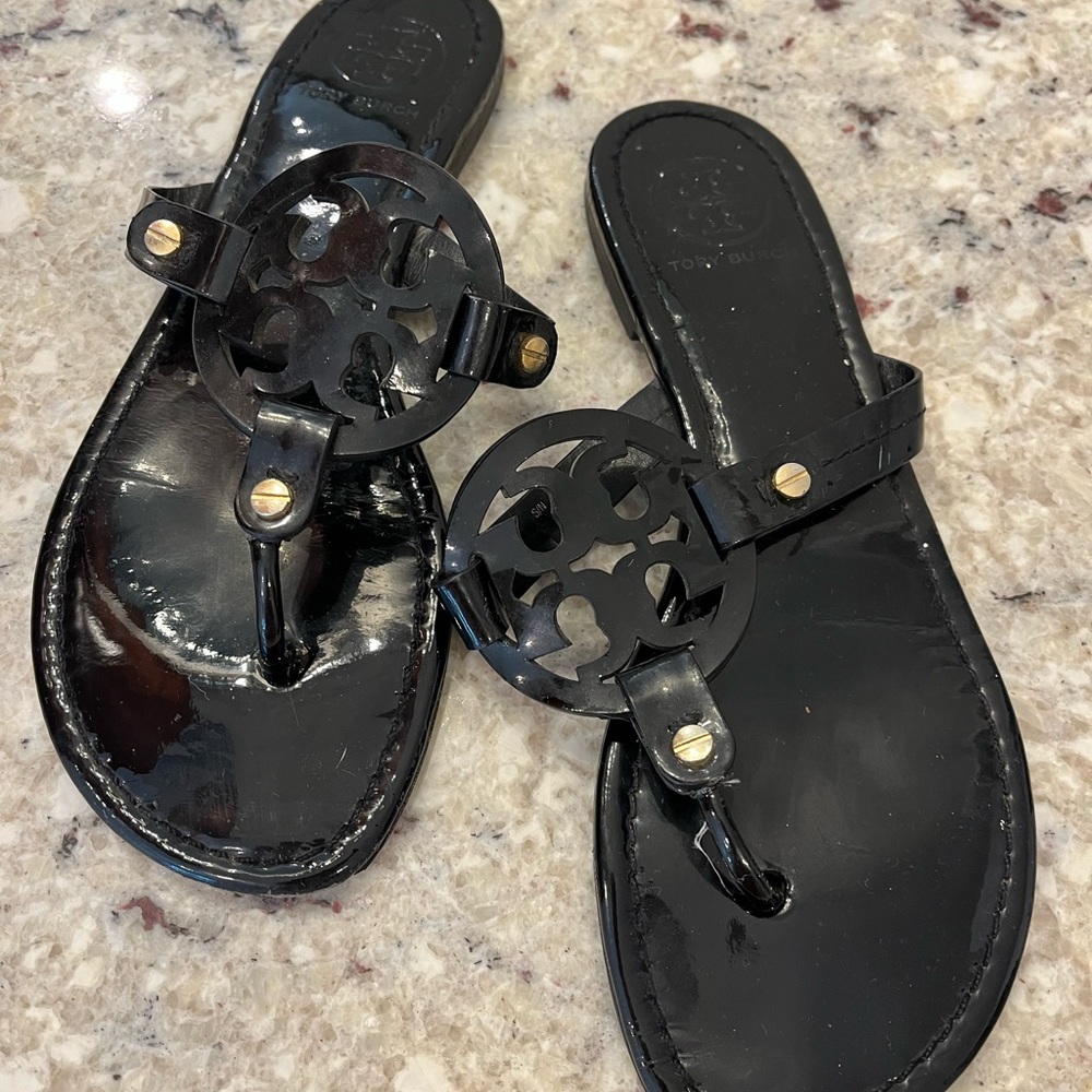 Well loved Tory Burch black patent flops